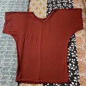 Too big but love it. Runs big. used  chami under due to dolman sleeves.